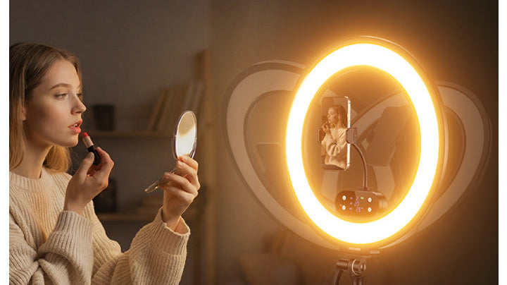 A girl is using the NEEWER RB18B cordless ring light to record makeup video.