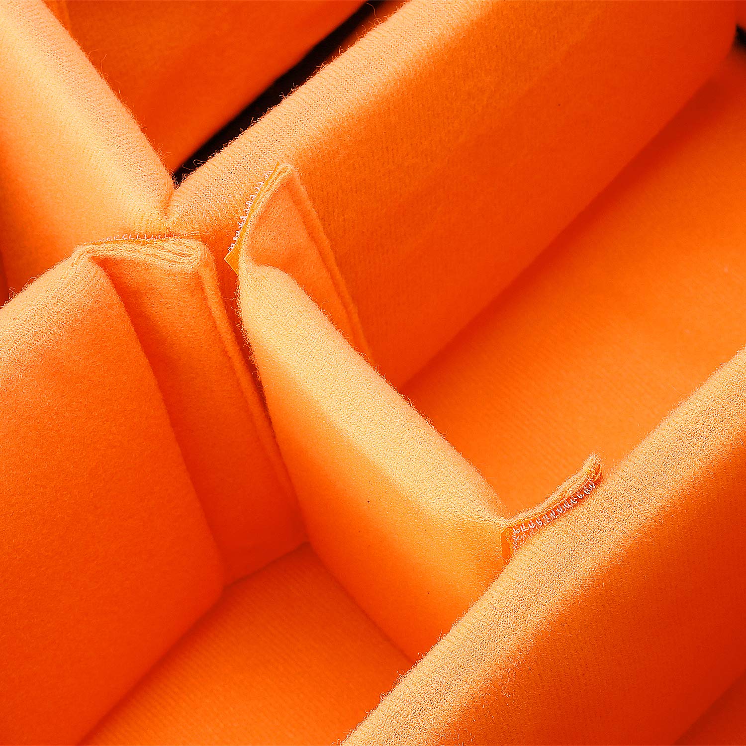 The taped cushions inside the bag are removable and adjustable.