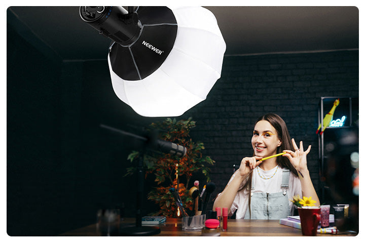 A content creator is using a softbox for product photography.
