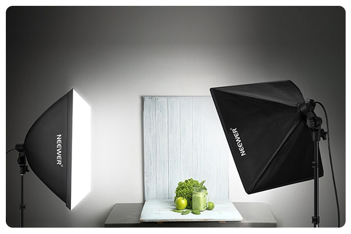 NEEWER two-light softbox kit setup for product photography with green smoothie and fruit on white marble surface