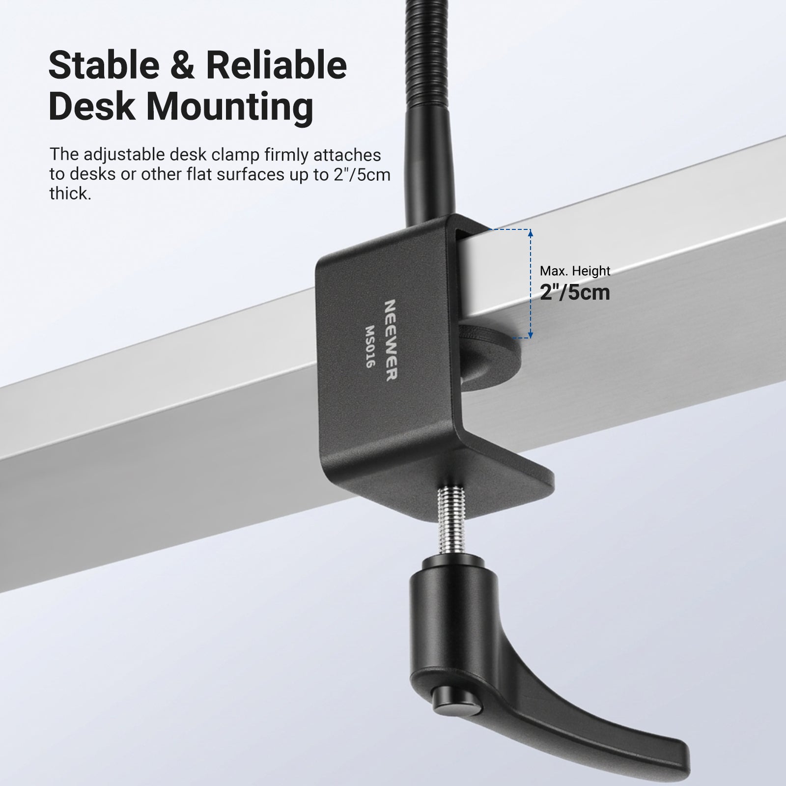 The adjustable desk clamp firmly attaches to the desk.