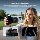 Woman taking photos with Neewer MG01 magnetic phone camera grip attached to smartphone in outdoor park setting
