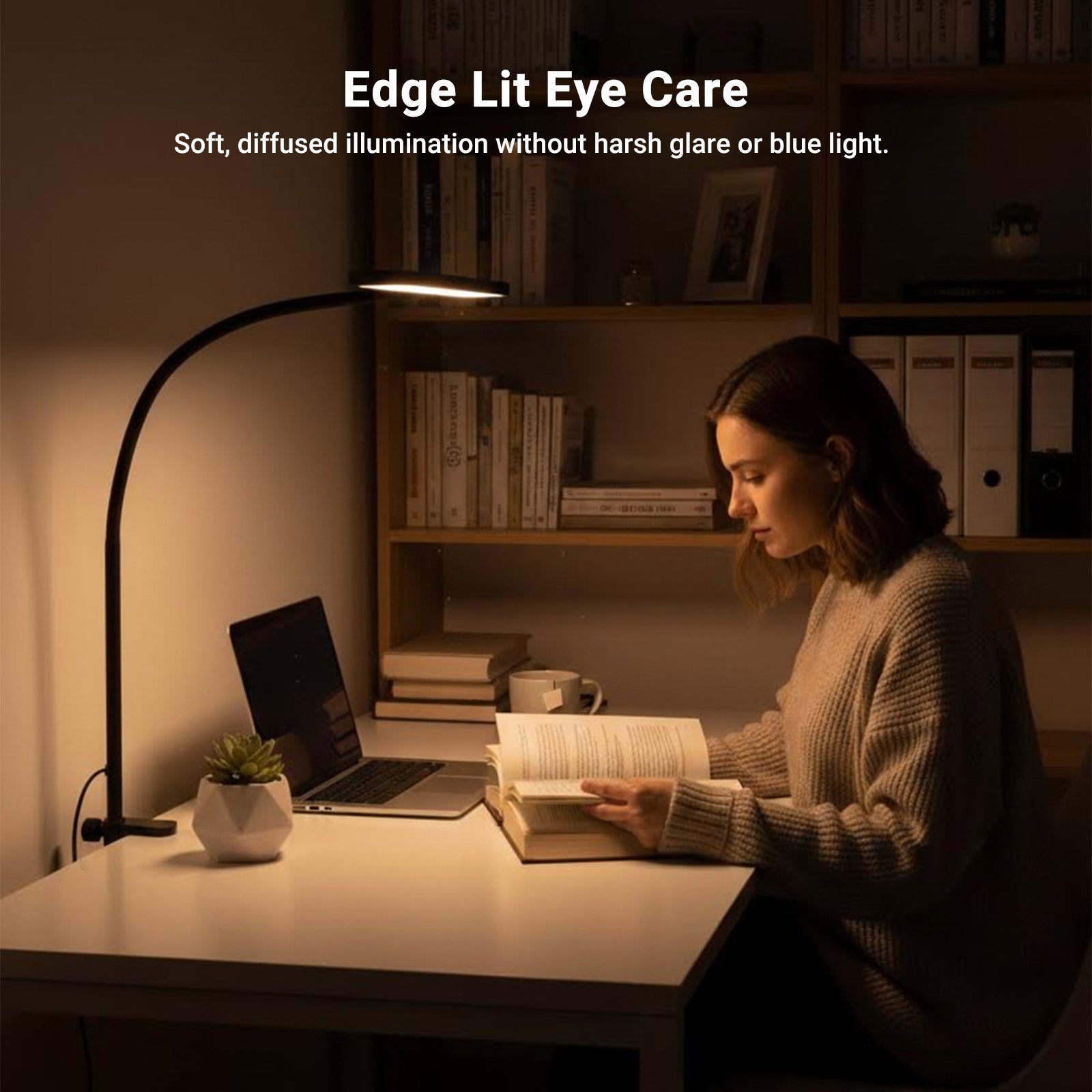 A woman reads a book at a cozy home desk, illuminated by the NEEWER N33 Clip On Desktop LED Lamp.