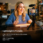 A content creator is live-streaming, using the NEEWER TL106B LED Chin Fill Light to create warm, even illumination on her face, while her smartphone on a tripod streams the session to viewers.